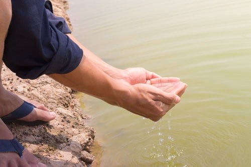 water hands with drought